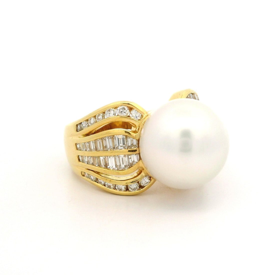 18k Yellow Gold Wide Cocktail Ring with 12.8mm Pearl and 1.47ct Diamonds: 18k Yellow Gold Wide Cocktail Ring with 12.8mm Pearl and 1.47ct Diamonds This exquisite wide cocktail ring features a stunning 12.8mm round cultured pearl with a pure white color and excellent luster,