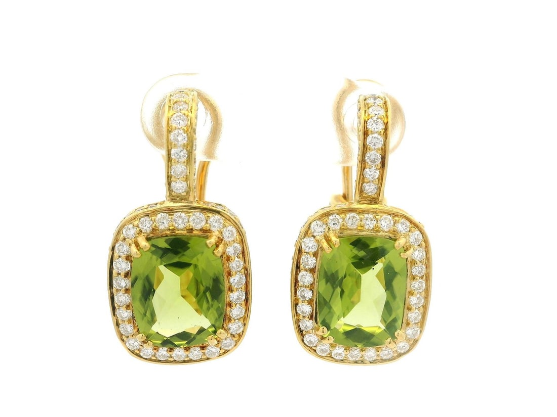 18k Yellow Gold 7ctw Dangle Drop Earrings with Peridot and Diamonds: 18k Yellow Gold 7ctw Dangle Drop Earrings with Peridot and Diamonds These elegant dangle earrings feature two natural cushion cut peridots, each measuring 10x8mm and totaling approximately 5ctw. The v