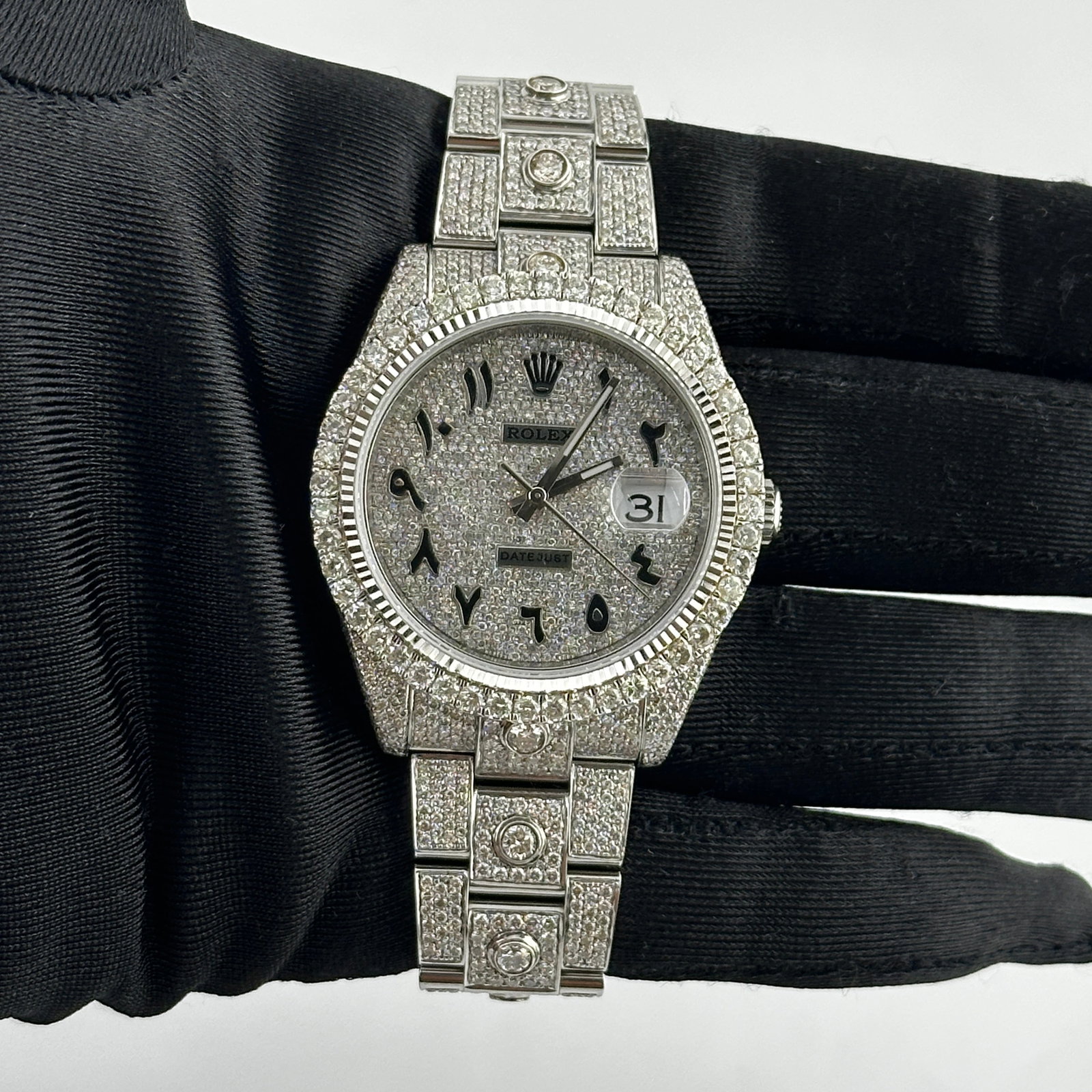 Rolex Datejust 126334 Diamond Arabic Dial Men's Watch with Solitaire Oyster Bracelet: Rolex Datejust 126334 Diamond Arabic Dial Men's Watch with Solitaire Oyster Bracelet This Rolex Datejust features an iced out Arabic dial and a prong diamond bezel, complemented by an iced out Oyster