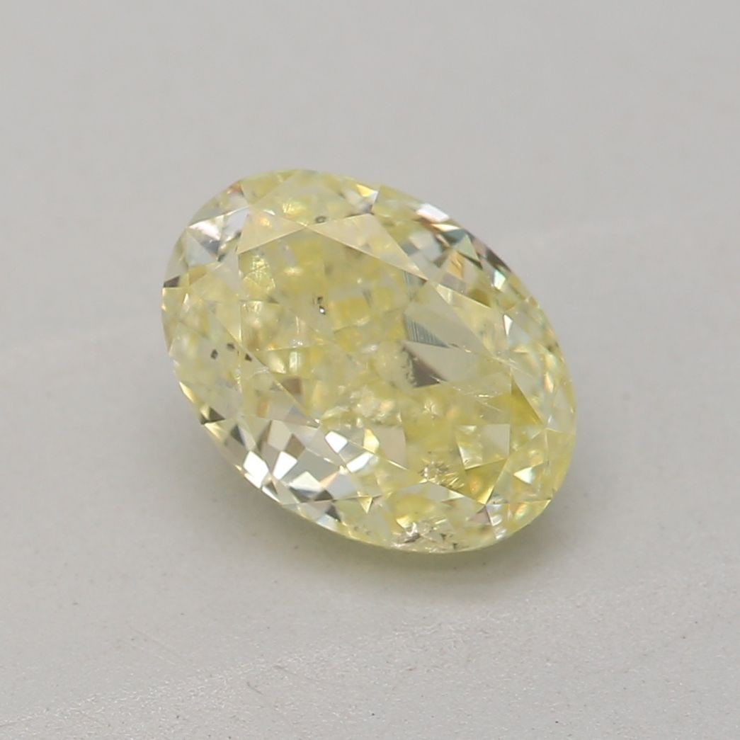 Loose Diamond - OVAL 0.78ct Fancy Yellow I1: Loose Diamond - OVAL 0.78ct Fancy Yellow I1 Source: Natural Shape: OVAL Carats: 0.78 Color: Fancy Yellow Certification: GIA Video: