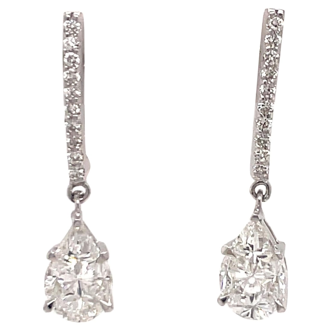 Harbor Diamonds 14K White Gold Diamond Drop Earrings 1.40 ct Contemporary Design: Harbor Diamonds 14K White Gold Diamond Drop Earrings 1.40 ct Contemporary Design These exquisite 14 Karat White Gold Diamond Drop Earrings showcase a stunning contemporary design. Crafted with precisi