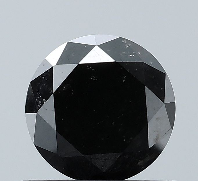 Loose Diamond - ROUND 0.74ct Fancy Black VVS2: Loose Diamond - ROUND 0.74ct Fancy Black VVS2 Source: Natural Shape: ROUND Carats: 0.74 Color: Fancy Black Certification: NONE Video: