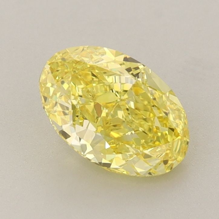 Loose Diamond - OVAL 1.12ct Fancy Vivid Yellow VVS2: Loose Diamond - OVAL 1.12ct Fancy Vivid Yellow VVS2 Source: This is a real non-mined Diamond that has been grown in a lab Shape: OVAL Carats: 1.12 Color: Fancy Vivid Yellow Certification: IGI Video: