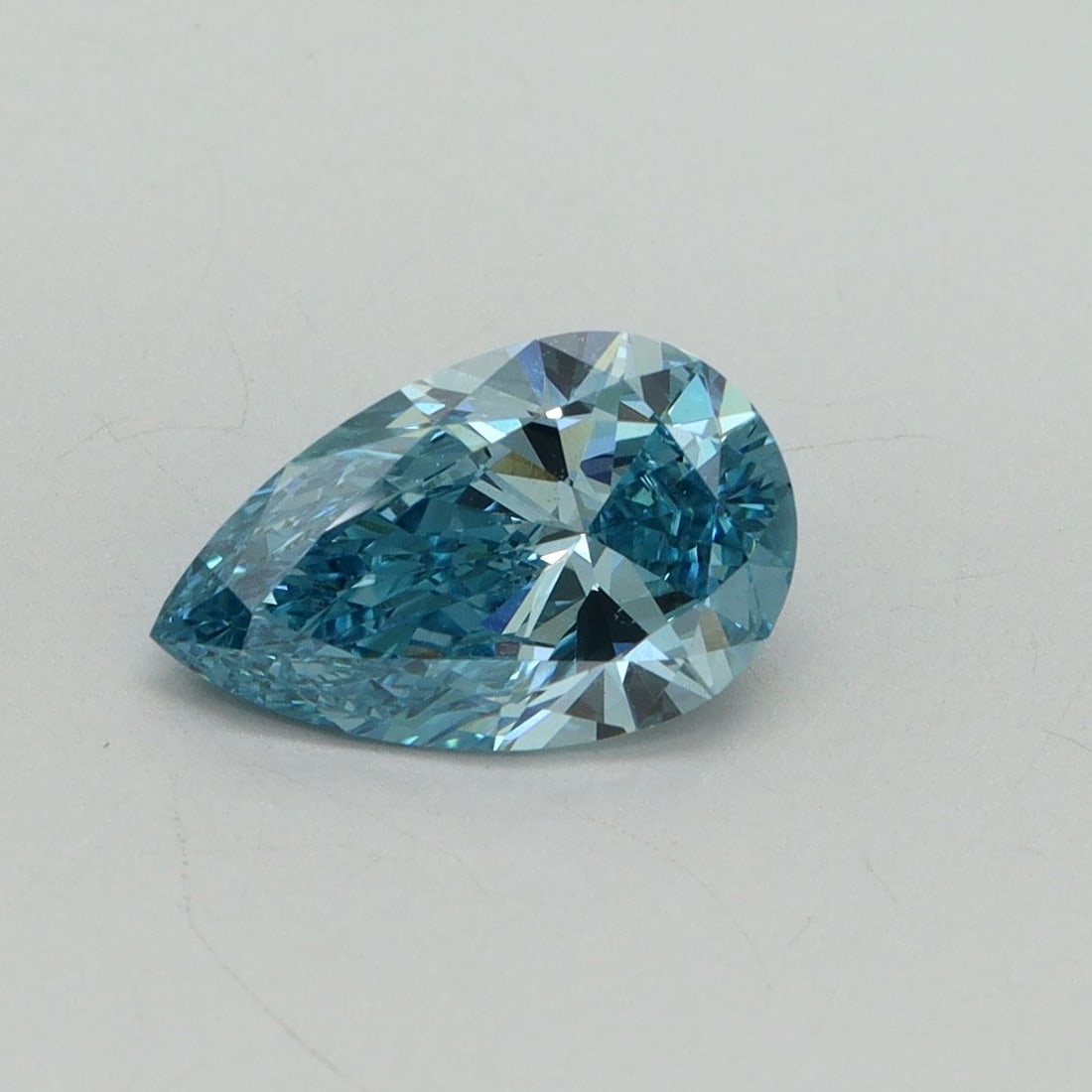 Loose Diamond - PEAR 1.31ct Fancy Vivid Blue VS1: Loose Diamond - PEAR 1.31ct Fancy Vivid Blue VS1 Source: This is a real non-mined Diamond that has been grown in a lab Shape: PEAR Carats: 1.31 Color: Fancy Vivid Blue Certification: IGI Video: