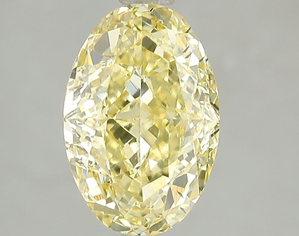 Loose Diamond - OVAL 3.04ct Fancy Intense Yellow SI1: Loose Diamond - OVAL 3.04ct Fancy Intense Yellow SI1 Source: This is a real non-mined Diamond that has been grown in a lab Shape: OVAL Carats: 3.04 Color: Fancy Intense Yellow Certification: IGI Video
