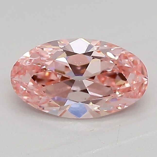 Loose Diamond - OVAL 0.71ct Fancy Vivid Pink VVS2: Loose Diamond - OVAL 0.71ct Fancy Vivid Pink VVS2 Source: This is a real non-mined Diamond that has been grown in a lab Shape: OVAL Carats: 0.71 Color: Fancy Vivid Pink Certification: IGI Video: