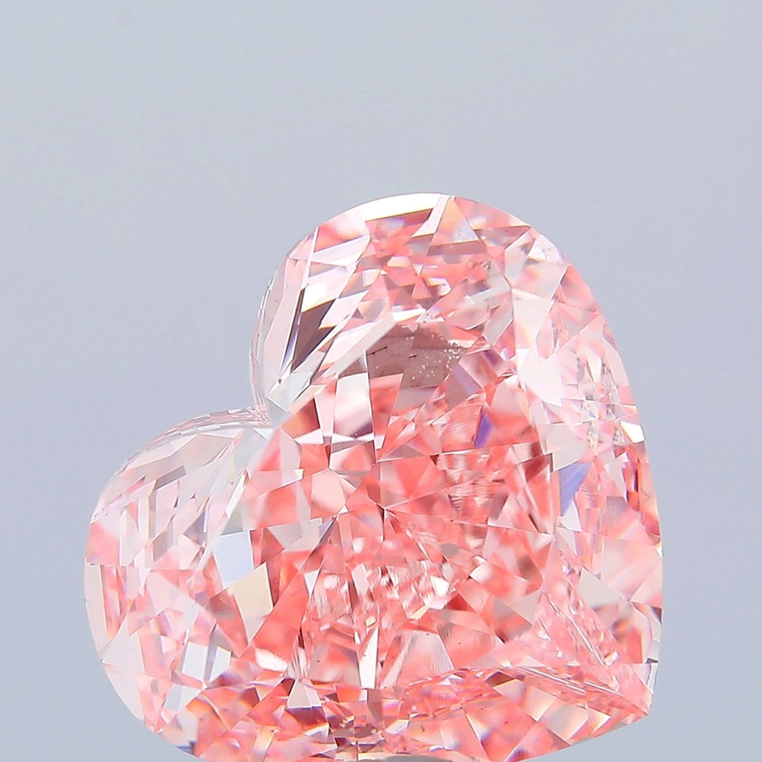 Loose Diamond - HEART 31.56ct Fancy Vivid Pink VS2: Loose Diamond - HEART 31.56ct Fancy Vivid Pink VS2 Source: This is a real non-mined Diamond that has been grown in a lab Shape: HEART Carats: 31.56 Color: Fancy Vivid Pink Certification: IGI Video: