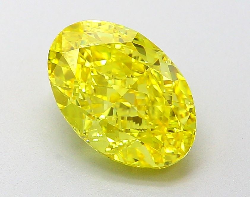 Loose Diamond - OVAL 2.02ct Fancy Vivid Yellow VVS2: Loose Diamond - OVAL 2.02ct Fancy Vivid Yellow VVS2 Source: This is a real non-mined Diamond that has been grown in a lab Shape: OVAL Carats: 2.02 Color: Fancy Vivid Yellow Certification: IGI Video:
