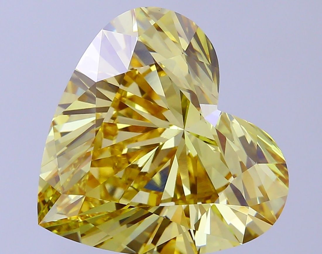 Loose Diamond - HEART 12.03ct Fancy Vivid Yellow VS1: Loose Diamond - HEART 12.03ct Fancy Vivid Yellow VS1 Source: This is a real non-mined Diamond that has been grown in a lab Shape: HEART Carats: 12.03 Color: Fancy Vivid Yellow Certification: IGI Video