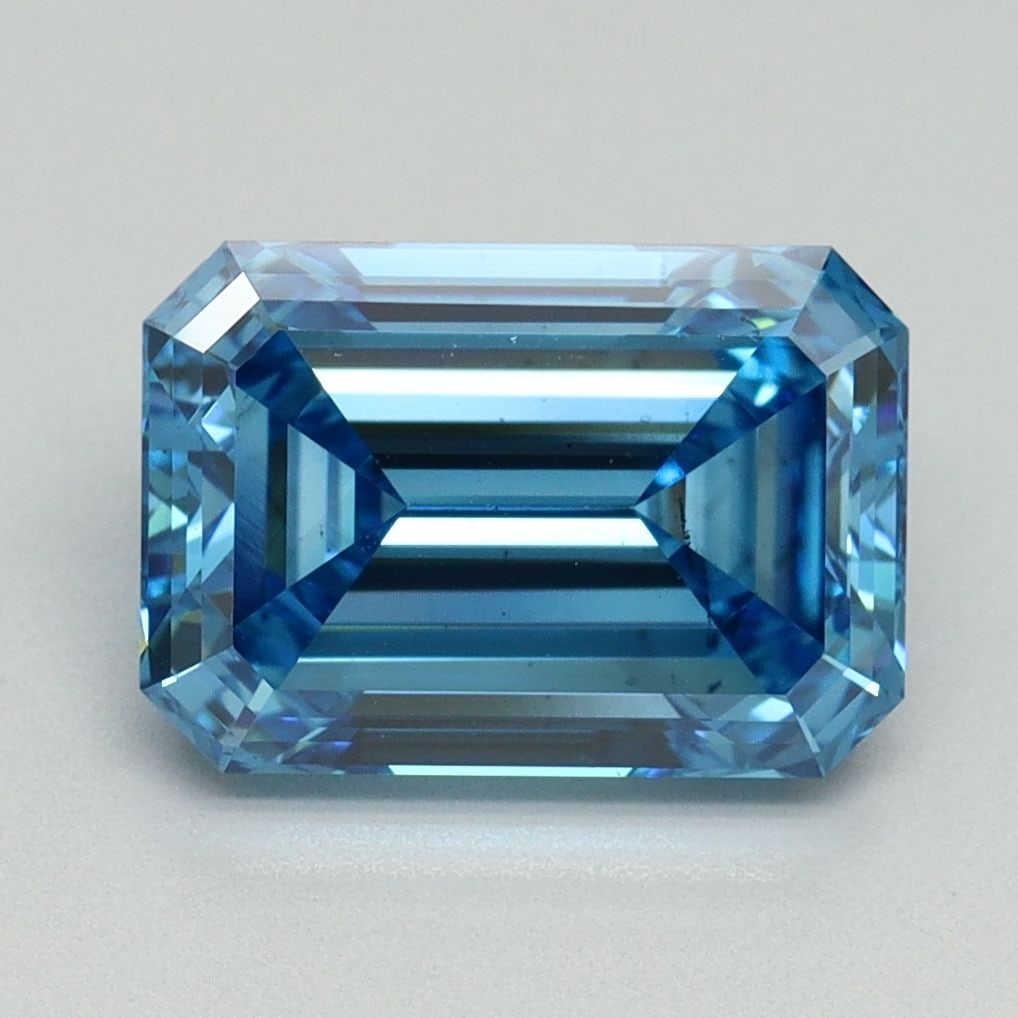 Loose Diamond - EMERALD 3.14ct Fancy Vivid Blue VS2: Loose Diamond - EMERALD 3.14ct Fancy Vivid Blue VS2 Source: This is a real non-mined Diamond that has been grown in a lab Shape: EMERALD Carats: 3.14 Color: Fancy Vivid Blue Certification: IGI Video: