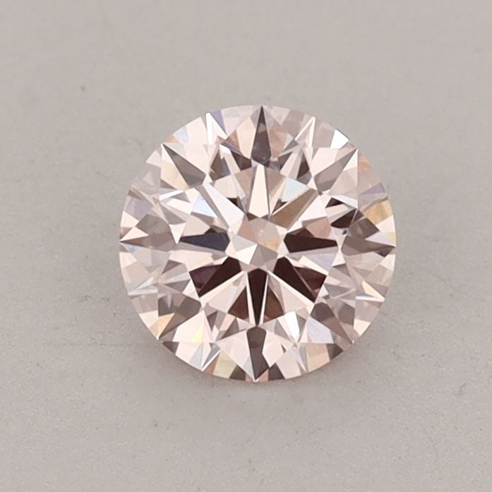 Ideal Loose Diamond - ROUND 0.59ct Fancy Pink VS1: Ideal Loose Diamond - ROUND 0.59ct Fancy Pink VS1 Source: This is a real non-mined Diamond that has been grown in a lab Shape: ROUND Carats: 0.59 Color: Fancy Pink Certification: IGI Video: