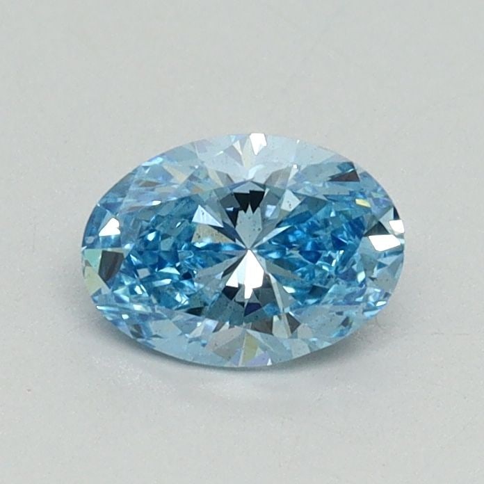 Loose Diamond - OVAL 0.54ct Fancy Vivid Blue SI1: Loose Diamond - OVAL 0.54ct Fancy Vivid Blue SI1 Source: This is a real non-mined Diamond that has been grown in a lab Shape: OVAL Carats: 0.54 Color: Fancy Vivid Blue Certification: IGI Video: