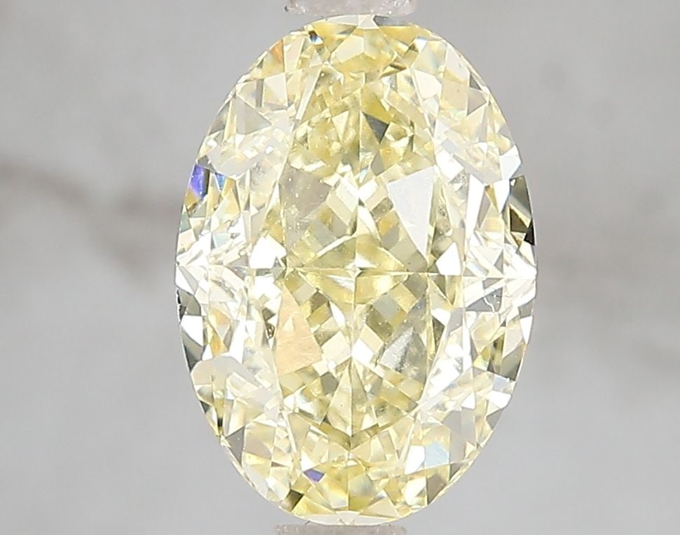 Loose Diamond - OVAL 3.03ct Fancy Intense Yellow VS1: Loose Diamond - OVAL 3.03ct Fancy Intense Yellow VS1 Source: This is a real non-mined Diamond that has been grown in a lab Shape: OVAL Carats: 3.03 Color: Fancy Intense Yellow Certification: IGI Video