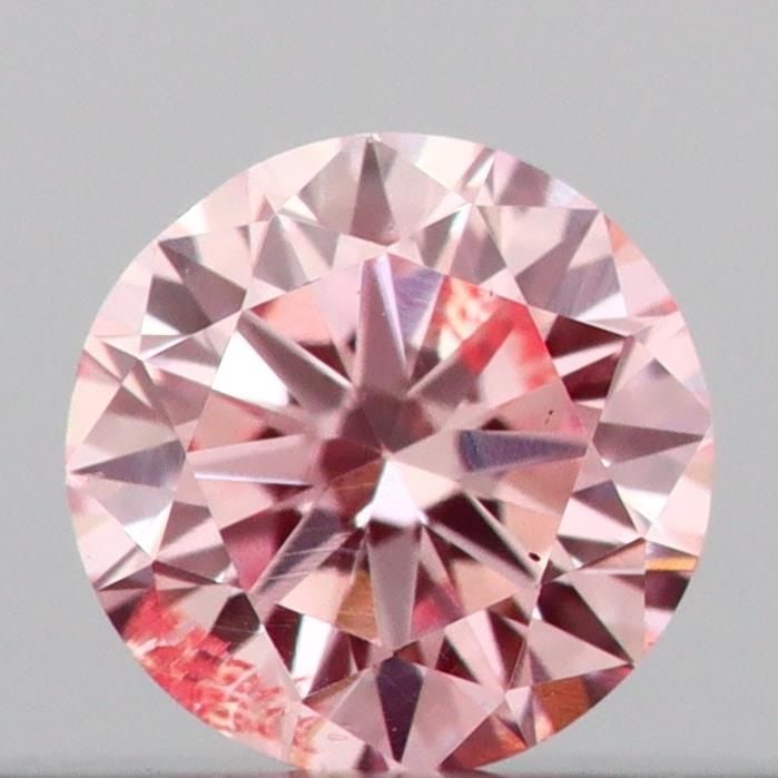 Loose Diamond - ROUND 0.14ct Fancy Intense Pink SI2: Loose Diamond - ROUND 0.14ct Fancy Intense Pink SI2 Source: This is a real non-mined Diamond that has been grown in a lab Shape: ROUND Carats: 0.14 Color: Fancy Intense Pink Certification: IGI Video: