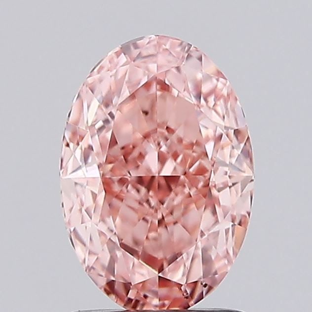 Loose Diamond - OVAL 1.64ct Fancy Vivid Pink VS2: Loose Diamond - OVAL 1.64ct Fancy Vivid Pink VS2 Source: This is a real non-mined Diamond that has been grown in a lab Shape: OVAL Carats: 1.64 Color: Fancy Vivid Pink Certification: IGI Video: