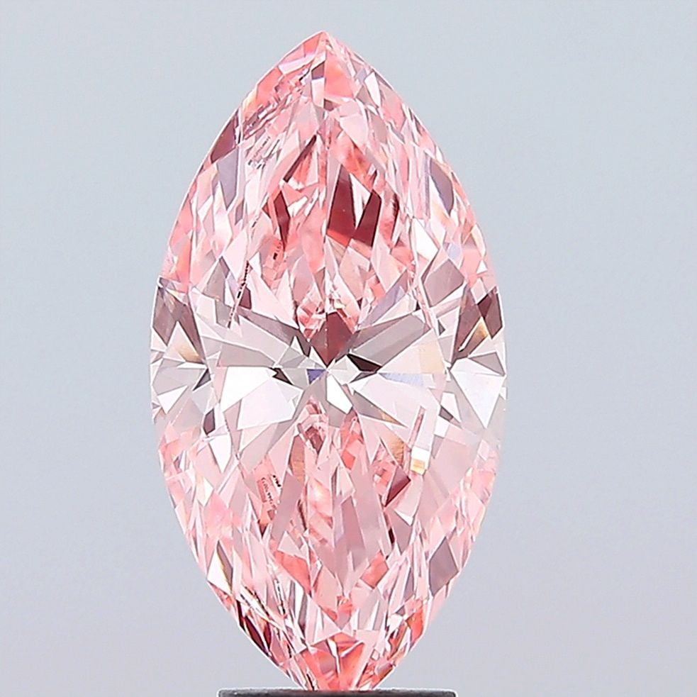 Loose Diamond - MARQUISE 5.03ct Fancy Vivid Pink VVS2: Loose Diamond - MARQUISE 5.03ct Fancy Vivid Pink VVS2 Source: This is a real non-mined Diamond that has been grown in a lab Shape: MARQUISE Carats: 5.03 Color: Fancy Vivid Pink Certification: IGI Vide