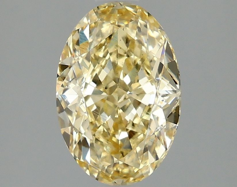 Loose Diamond - OVAL 2.07ct Fancy Intense Yellow VS1: Loose Diamond - OVAL 2.07ct Fancy Intense Yellow VS1 Source: This is a real non-mined Diamond that has been grown in a lab Shape: OVAL Carats: 2.07 Color: Fancy Intense Yellow Certification: IGI Video