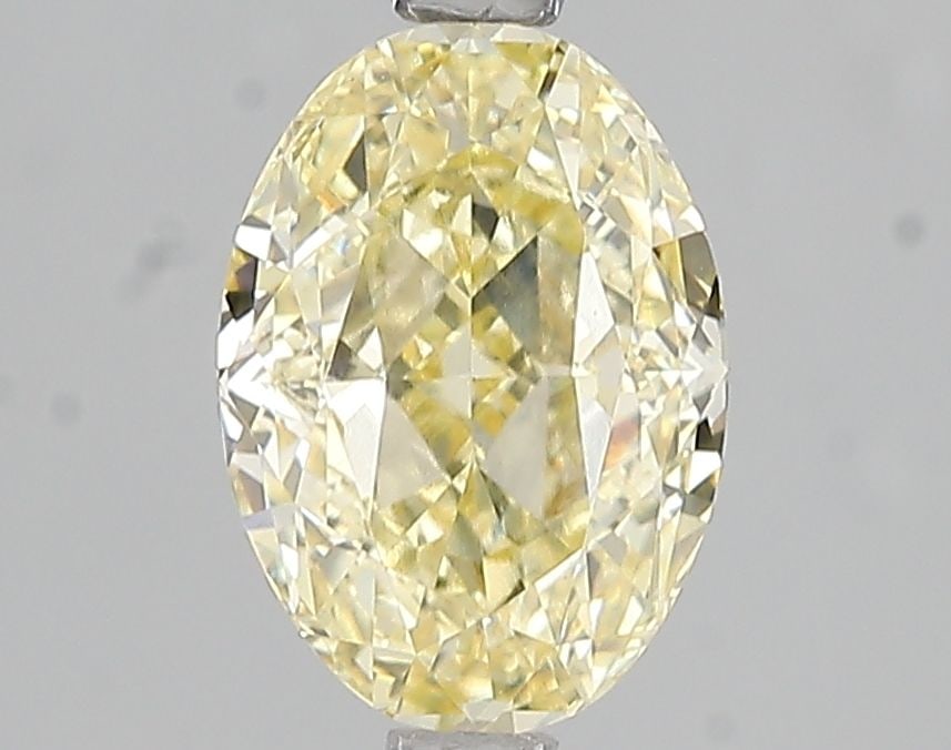 Loose Diamond - OVAL 2.06ct Fancy Intense Yellow VS1: Loose Diamond - OVAL 2.06ct Fancy Intense Yellow VS1 Source: This is a real non-mined Diamond that has been grown in a lab Shape: OVAL Carats: 2.06 Color: Fancy Intense Yellow Certification: IGI Video