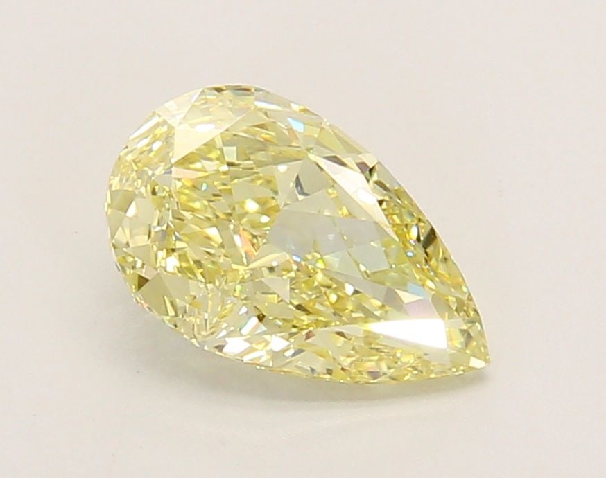 Loose Diamond - PEAR 1.56ct Fancy Yellow VVS2: Loose Diamond - PEAR 1.56ct Fancy Yellow VVS2 Source: This is a real non-mined Diamond that has been grown in a lab Shape: PEAR Carats: 1.56 Color: Fancy Yellow Certification: IGI Video: