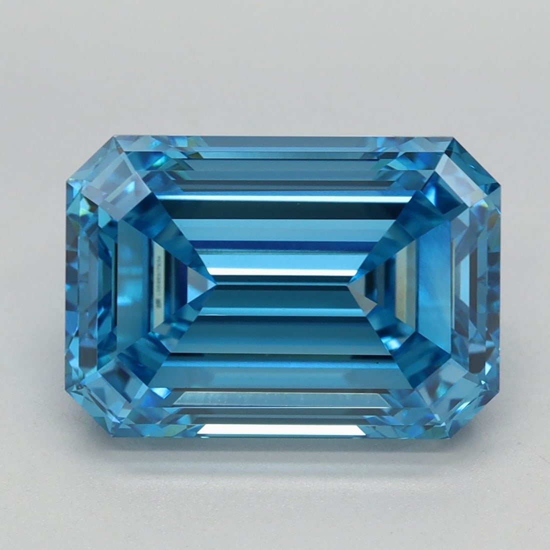 Loose Diamond - EMERALD 5.21ct Fancy Vivid Blue VS1: Loose Diamond - EMERALD 5.21ct Fancy Vivid Blue VS1 Source: This is a real non-mined Diamond that has been grown in a lab Shape: EMERALD Carats: 5.21 Color: Fancy Vivid Blue Certification: IGI Video: