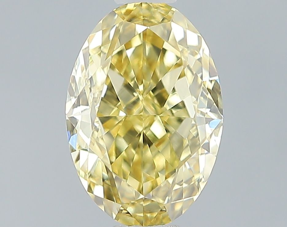Loose Diamond - OVAL 1.61ct Fancy Vivid Yellow VS1: Loose Diamond - OVAL 1.61ct Fancy Vivid Yellow VS1 Source: This is a real non-mined Diamond that has been grown in a lab Shape: OVAL Carats: 1.61 Color: Fancy Vivid Yellow Certification: IGI Video: