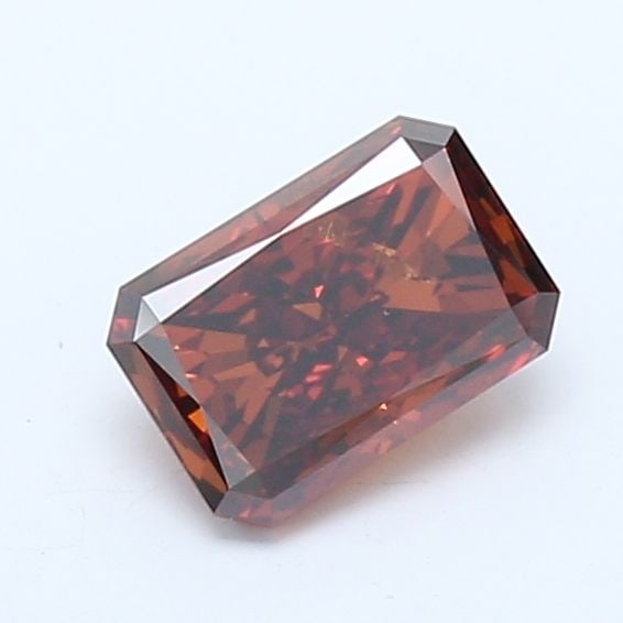 Loose Diamond - RADIANT 1.0ct Fancy Orange SI2: Loose Diamond - RADIANT 1.0ct Fancy Orange SI2 Source: This is a real non-mined Diamond that has been grown in a lab Shape: RADIANT Carats: 1.0 Color: Fancy Orange Certification: IGI Video: