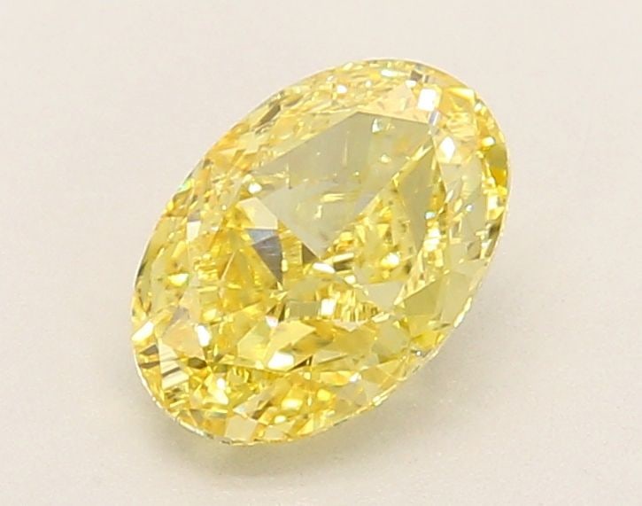 Loose Diamond - OVAL 1.39ct Fancy Vivid Yellow VS2: Loose Diamond - OVAL 1.39ct Fancy Vivid Yellow VS2 Source: This is a real non-mined Diamond that has been grown in a lab Shape: OVAL Carats: 1.39 Color: Fancy Vivid Yellow Certification: IGI Video: