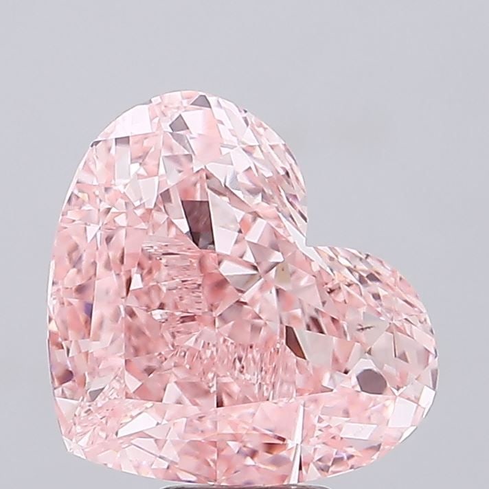 Loose Diamond - HEART 11.05ct Fancy Vivid Pink VVS2: Loose Diamond - HEART 11.05ct Fancy Vivid Pink VVS2 Source: This is a real non-mined Diamond that has been grown in a lab Shape: HEART Carats: 11.05 Color: Fancy Vivid Pink Certification: IGI Video: