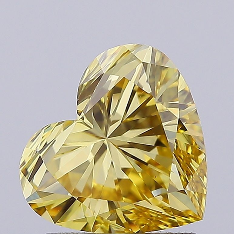 Loose Diamond - HEART 1.58ct Fancy Intense Yellow VS1: Loose Diamond - HEART 1.58ct Fancy Intense Yellow VS1 Source: This is a real non-mined Diamond that has been grown in a lab Shape: HEART Carats: 1.58 Color: Fancy Intense Yellow Certification: IGI Vid