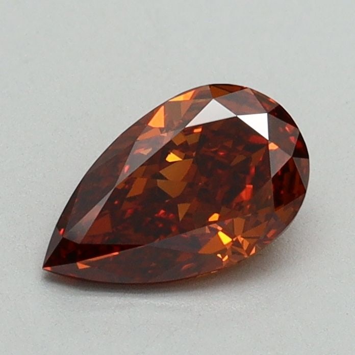 Loose Diamond - PEAR 0.69ct Fancy Orange VS1: Loose Diamond - PEAR 0.69ct Fancy Orange VS1 Source: This is a real non-mined Diamond that has been grown in a lab Shape: PEAR Carats: 0.69 Color: Fancy Orange Certification: IGI Video: