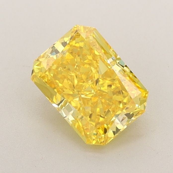 Loose Diamond - RADIANT 0.85ct Fancy Vivid Yellow VS1: Loose Diamond - RADIANT 0.85ct Fancy Vivid Yellow VS1 Source: This is a real non-mined Diamond that has been grown in a lab Shape: RADIANT Carats: 0.85 Color: Fancy Vivid Yellow Certification: IGI The