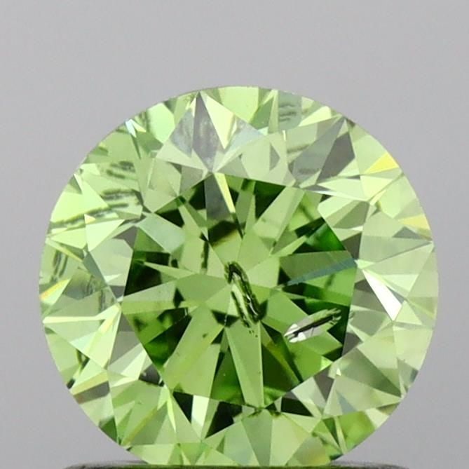 Loose Diamond - ROUND 0.9ct Fancy Vivid Green SI2: Loose Diamond - ROUND 0.9ct Fancy Vivid Green SI2 Source: This is a real non-mined Diamond that has been grown in a lab Shape: ROUND Carats: 0.9 Color: Fancy Vivid Green Certification: IGI Video:
