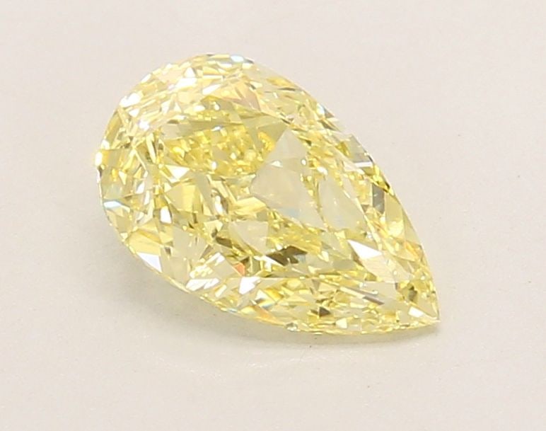 Loose Diamond - PEAR 1.03ct Fancy Intense Yellow VVS2: Loose Diamond - PEAR 1.03ct Fancy Intense Yellow VVS2 Source: This is a real non-mined Diamond that has been grown in a lab Shape: PEAR Carats: 1.03 Color: Fancy Intense Yellow Certification: IGI Vide