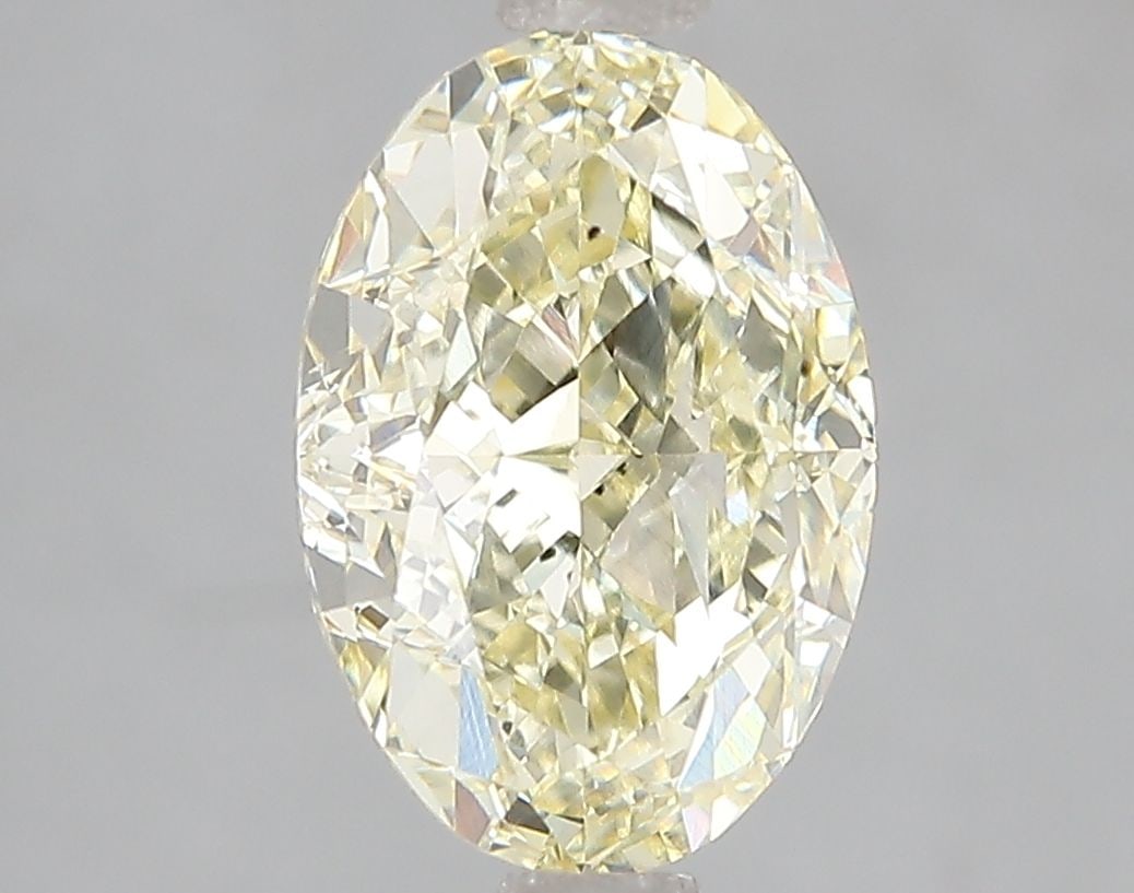 Loose Diamond - OVAL 3.07ct Fancy Yellow VS2: Loose Diamond - OVAL 3.07ct Fancy Yellow VS2 Source: This is a real non-mined Diamond that has been grown in a lab Shape: OVAL Carats: 3.07 Color: Fancy Yellow Certification: IGI Video: