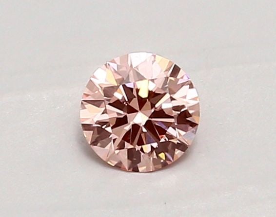 Ideal Loose Diamond - ROUND 0.4ct Fancy Vivid Pink VS1: Ideal Loose Diamond - ROUND 0.4ct Fancy Vivid Pink VS1 Source: This is a real non-mined Diamond that has been grown in a lab Shape: ROUND Carats: 0.4 Color: Fancy Vivid Pink Certification: IGI Video: