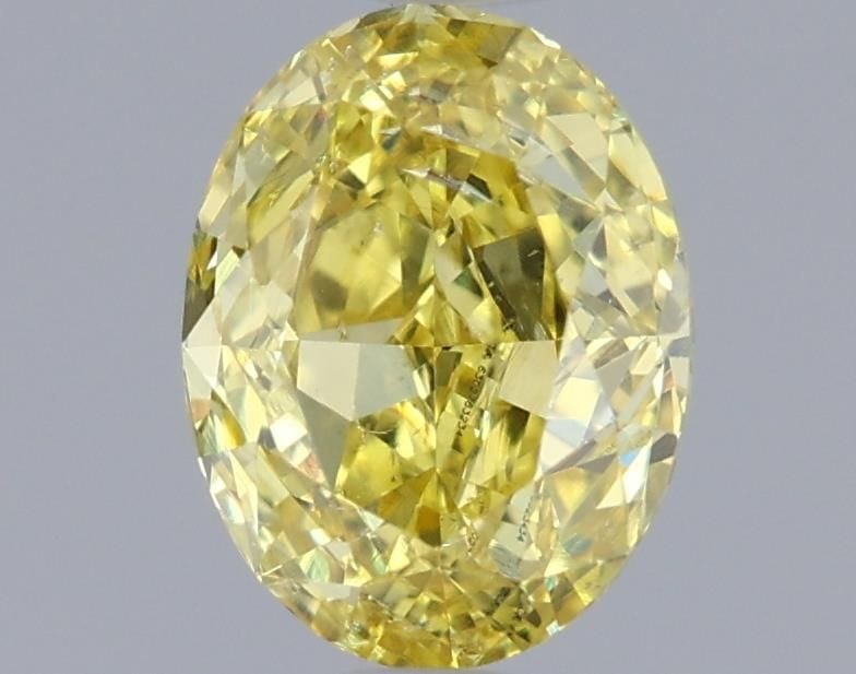 Loose Diamond - OVAL 0.71ct Fancy Vivid Yellow SI2: Loose Diamond - OVAL 0.71ct Fancy Vivid Yellow SI2 Source: Natural Shape: OVAL Carats: 0.71 Color: Fancy Vivid Yellow Certification: GIA Video: