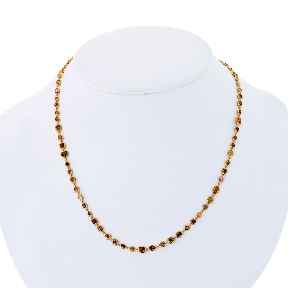 18K Yellow Gold 10.5ct Fancy and White Diamonds By The Yard Necklace: 18K Yellow Gold 10.5ct Fancy and White Diamonds By The Yard Necklace This exquisite Diamonds By The Yard necklace is crafted from 18K yellow gold and features a stunning array of fancy color and white