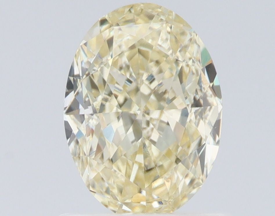 Loose Diamond - OVAL 1.02ct Fancy Light Yellow VS2: Loose Diamond - OVAL 1.02ct Fancy Light Yellow VS2 Source: Natural Shape: OVAL Carats: 1.02 Color: Fancy Light Yellow Certification: GIA Video: