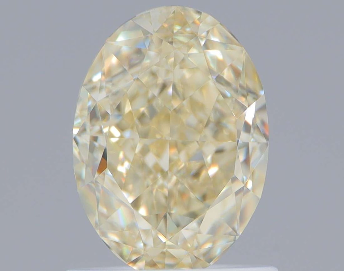 Loose Diamond - OVAL 1.23ct Fancy Light Yellow VS1: Loose Diamond - OVAL 1.23ct Fancy Light Yellow VS1 Source: Natural Shape: OVAL Carats: 1.23 Color: Fancy Light Yellow Certification: GIA Video: