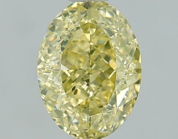 Loose Diamond - OVAL 1.01ct Fancy Yellow SI1: Loose Diamond - OVAL 1.01ct Fancy Yellow SI1 Source: Natural Shape: OVAL Carats: 1.01 Color: Fancy Yellow Certification: GIA Video: