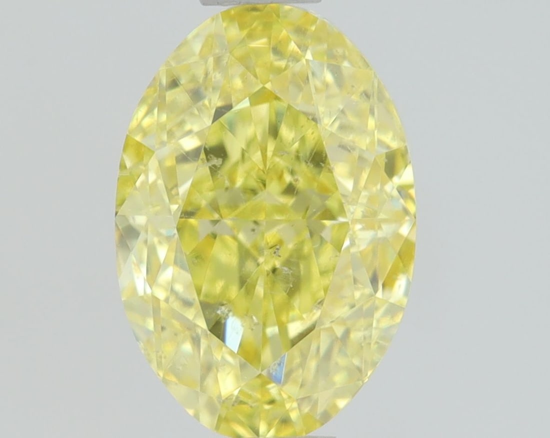Loose Diamond - OVAL 0.73ct Fancy Intense Yellow SI2: Loose Diamond - OVAL 0.73ct Fancy Intense Yellow SI2 Source: Natural Shape: OVAL Carats: 0.73 Color: Fancy Intense Yellow Certification: GIA Video: