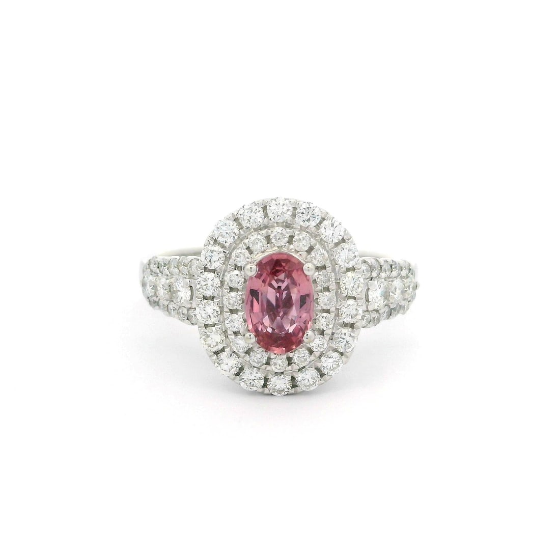 14k White Gold GIA 2.3ctw Pink Sapphire Diamond Halo Ring: 14k White Gold GIA 2.3ctw Pink Sapphire Diamond Halo Ring This exquisite cocktail ring features a stunning 14k white gold setting adorned with a captivating 2.3ctw pink sapphire at its center. The nat