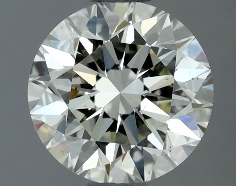 Loose Diamond - ROUND 0.9ct N SI1: Loose Diamond - ROUND 0.9ct N SI1 Source: Natural Shape: ROUND Carats: 0.9 Color: N Clarity: SI1 Certification: GIA The Diamond Depot Guarantee: All items in this auction are guaranteed to be 100% aut