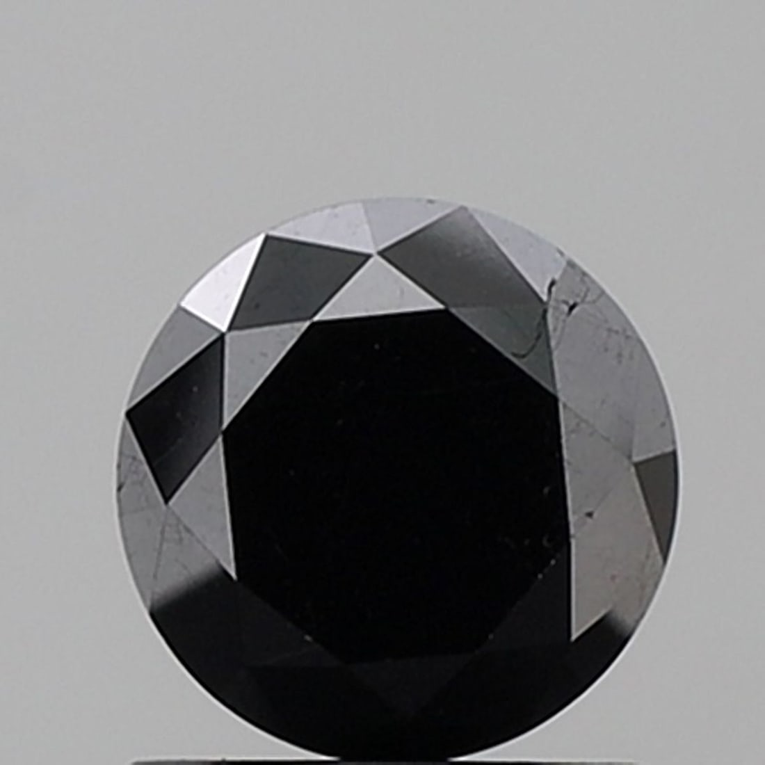 Loose Diamond - ROUND 1.27ct Fancy Black VS1: Loose Diamond - ROUND 1.27ct Fancy Black VS1 Source: Natural Shape: ROUND Carats: 1.27 Color: Fancy Black Certification: NONE Video: