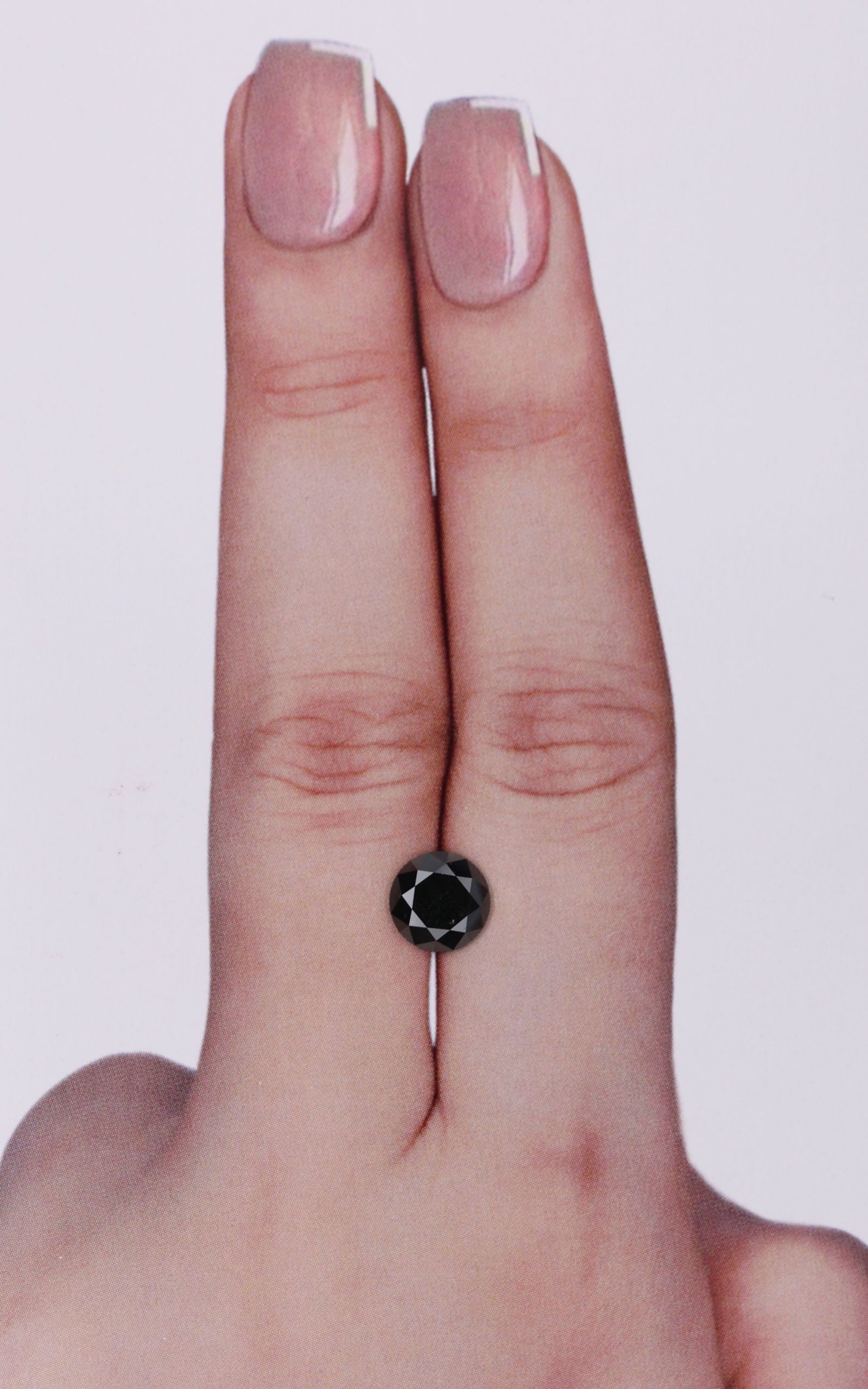 Loose Diamond - ROUND 1.43ct Black: Loose Diamond - ROUND 1.43ct Black Source: Natural Shape: ROUND Carats: 1.43 Color: Black Certification: IGI Video: