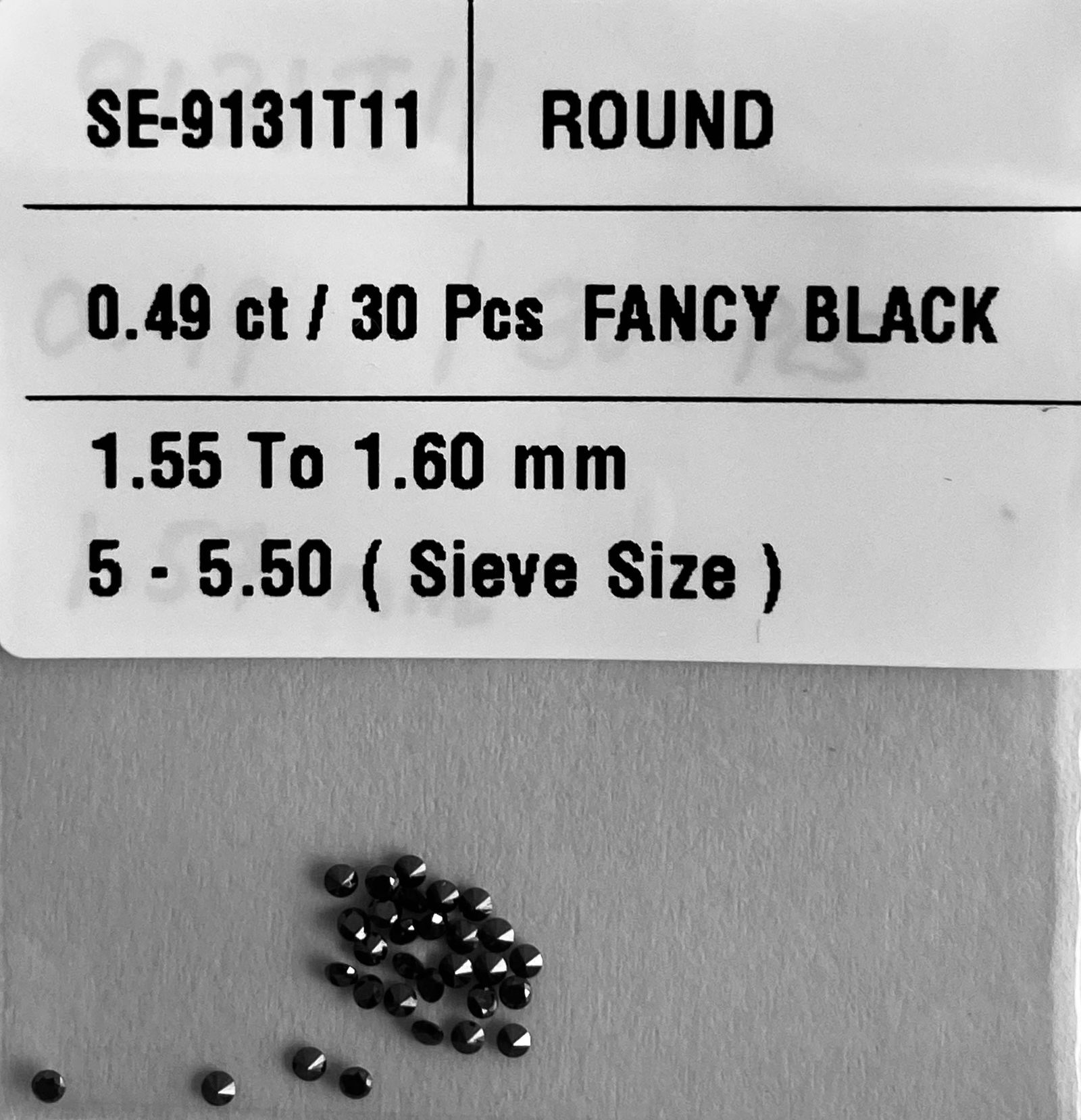 Loose Diamond - ROUND 0.49ct Fancy Black VVS2: Loose Diamond - ROUND 0.49ct Fancy Black VVS2 Source: Natural Shape: ROUND Carats: 0.49 Color: Fancy Black Certification: NONE The Diamond Depot Guarantee: All items in this auction are guaranteed to