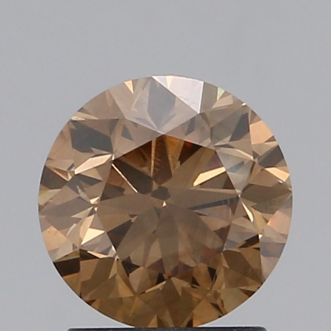 Loose Diamond - ROUND 1.48ct Orangey Brown VVS1: Loose Diamond - ROUND 1.48ct Orangey Brown VVS1 Source: Natural Shape: ROUND Carats: 1.48 Color: Orangey Brown Certification: NONE Video: