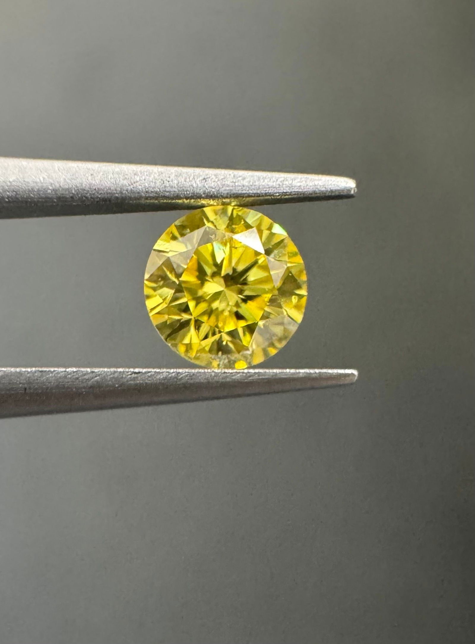 Loose Diamond - ROUND 0.25ct Fancy Intense Yellow I1: Loose Diamond - ROUND 0.25ct Fancy Intense Yellow I1 Source: Natural Shape: ROUND Carats: 0.25 Color: Fancy Intense Yellow Certification: GIA The Diamond Depot Guarantee: All items in this auction are