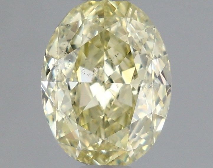 Loose Diamond - OVAL 1.0ct Fancy Yellow SI2: Loose Diamond - OVAL 1.0ct Fancy Yellow SI2 Source: Natural Shape: OVAL Carats: 1.0 Color: Fancy Yellow Certification: GIA Video: