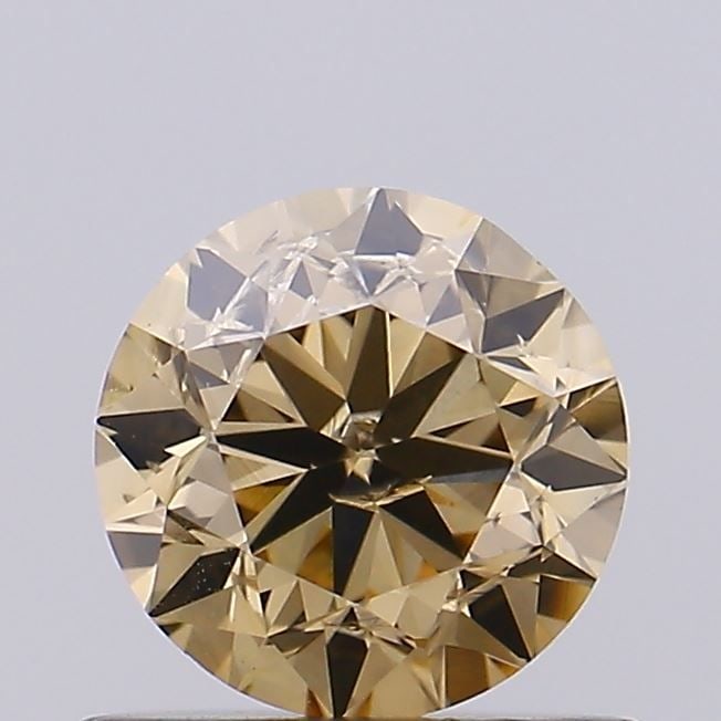 Loose Diamond - ROUND 0.71ct Fancy Brown SI2: Loose Diamond - ROUND 0.71ct Fancy Brown SI2 Source: Natural Shape: ROUND Carats: 0.71 Color: Fancy Brown Certification: NONE Video: